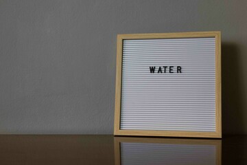 Water Letterboard with copy space 