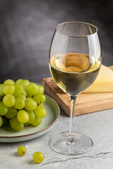 Glass of white wine on the table.