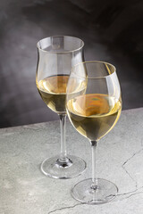 Glass of white wine on the table.