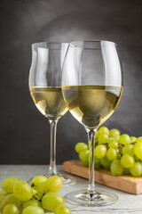 Glass of white wine on the table.