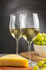 Glass of white wine on the table.