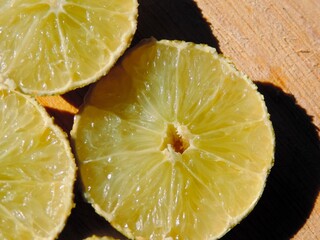 Lemon and lime slices close up