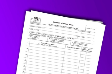 Fototapeta na wymiar Form 8851 documentation published IRS USA 07.17.2012. American tax document on colored