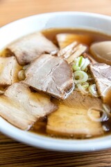 Japanese style ramen noodles Placed on a brown wooden table