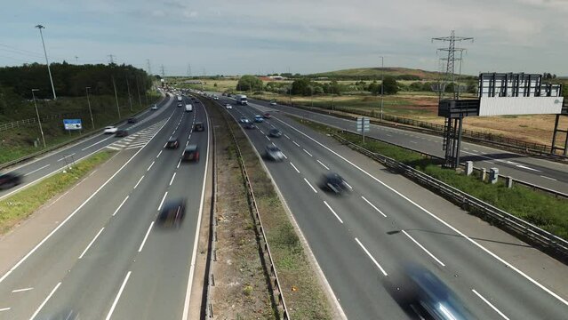 Motorway traffic with cars and trucks