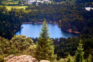 lake with forest and pines around in a sunny day  on mineral del chico hidalgo