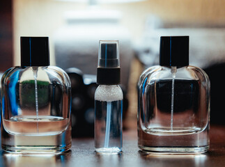 bottle of perfume on blue background