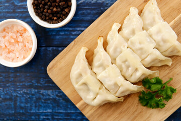 Freshly baked dumplings with plenty of gravy on the table
