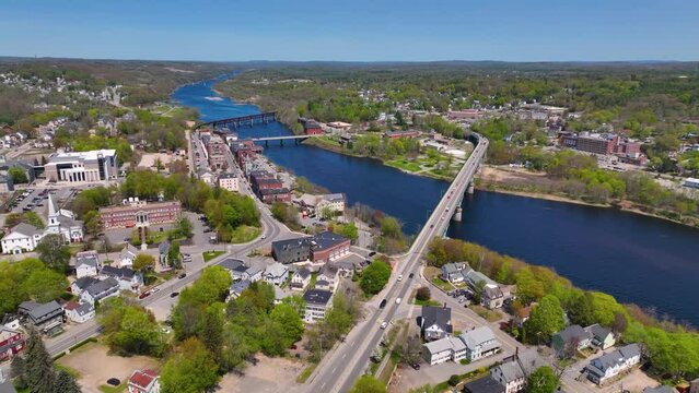 Memorial Bridge aerial view over Kennebec River in historic downtown of Augusta, Maine ME, USA. 