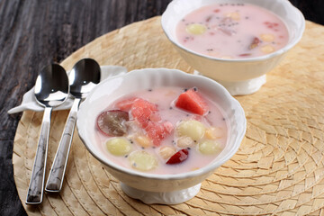 Sop Buah or Es Buah is Mixed Fruit with Coconut or Simple Syrup, Served with Shaved Ice and add Condensed Milk to Add Creamy Swetened