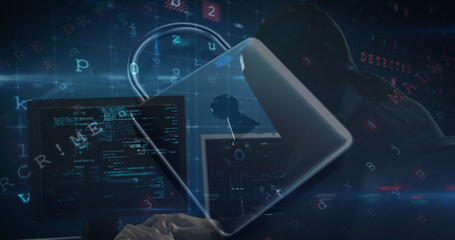 Fototapeta premium Image of cyber attack warning over online security padlock and hacker