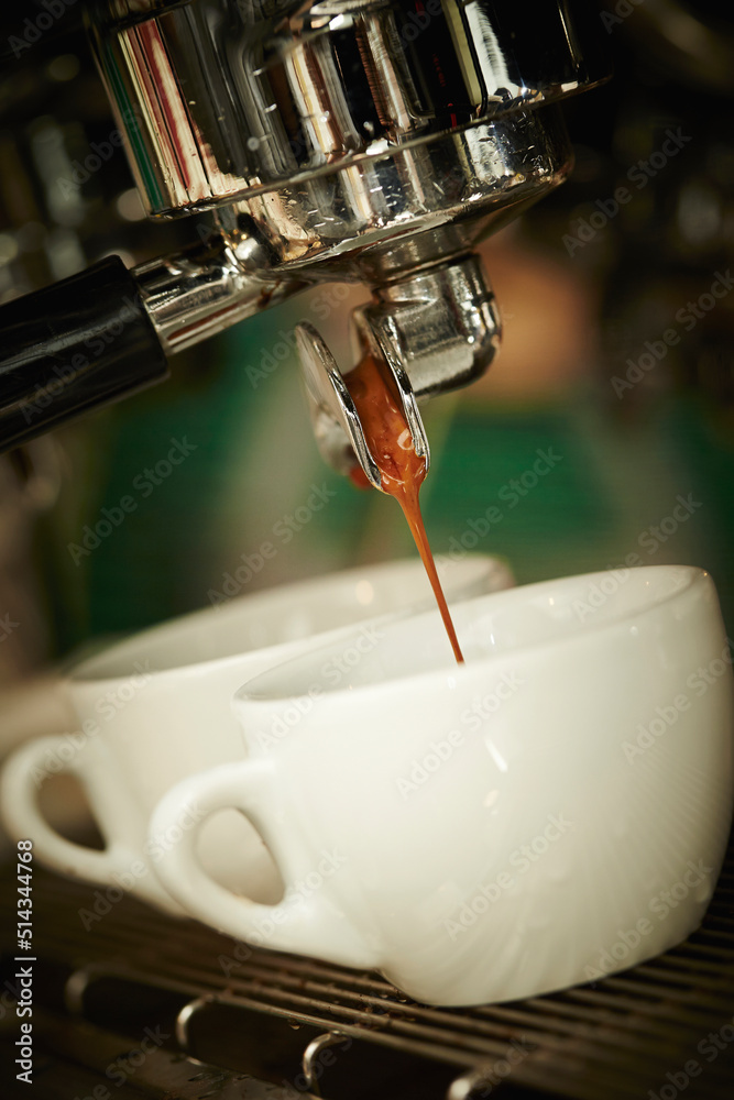 Wall mural pouring coffee into a cup