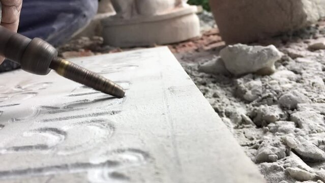 Close up video of Stone Carving, Letter Engraving
