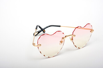 Women's sunglasses with graduated heart-shaped lenses.