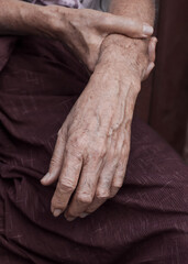 Fototapeta premium Hand of Asian elder man. Concept of rheumatoid arthritis, osteoarthritis, or joint pain