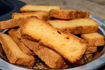 Crunchy Rusk or Toast for healthy life, Traditional biscuit , toast bread, crunchy toast, crispy milk rusk, toast plate on the table