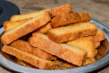 Crunchy Rusk or Toast for healthy life, Traditional biscuit , toast bread, crunchy toast, crispy milk rusk, toast plate on the table