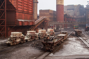 Empty slag carrier wagons on rail track