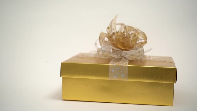 falling down gold giftbox