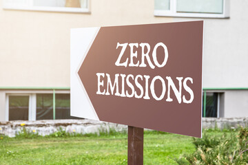 Zero Emissions. Directional arrow with text. Warm and sunny day