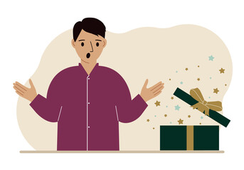 A man next to an open gift. The concept of a holiday, surprise, promotion, discount.