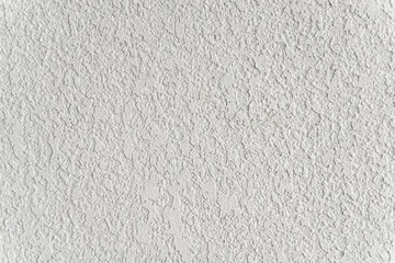 White wall with plaster background. Plaster and putty grain surface texture. Finishing, decor concept.