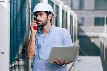 Technician working and inspecting the pipeline in factory