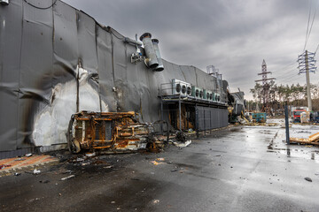 Hostomel, Kyev region Ukraine - 09.04.2022: Outside the store, which was bombed, was looted by...