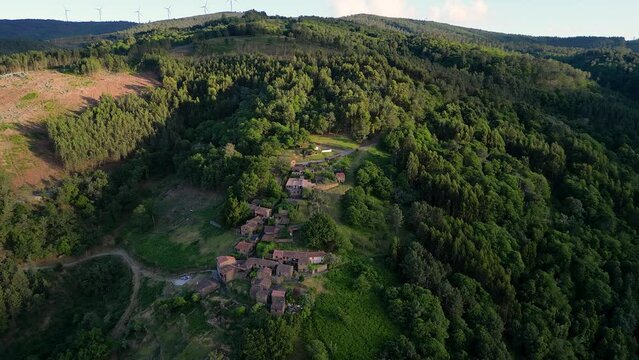 Aerial drone view of Talasnal, slate stone village, Sunset, Lousa, Portugal
