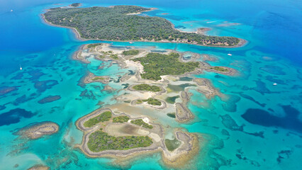 Aerial drone photo of paradise volcanic island complex resembling a blue lagoon archipelago in exotic destination bay with deep turquoise sea and crystal clear water beach