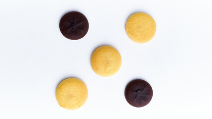 close-up of chocolate brownie and nastar cake