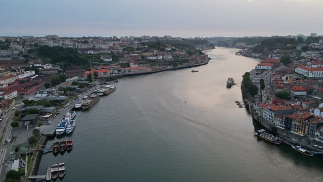 Aerial view of the old town on the Douro River, Backward flight of the drone, Porto, Portugal