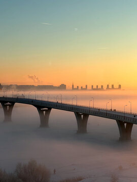 Yakhtenniy Bridge Over The Great Nevka River Against Sky During Sunset In Winter