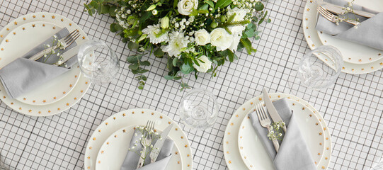 Beautiful wedding table setting with floral decor
