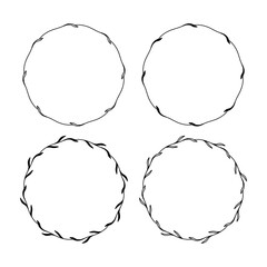 Set of 4 hand drawn spring wreaths isolated on white background, vector. Outline and silhouette frames with leaves. Doodle style.Collection of floral monogram frames.