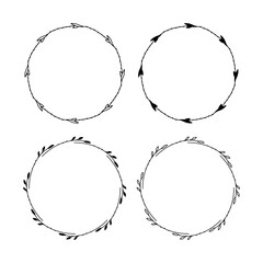 Set of 4 hand drawn spring wreaths isolated on white background, vector. Outline and silhouette frames with leaves. Doodle style.Collection of floral monogram frames.