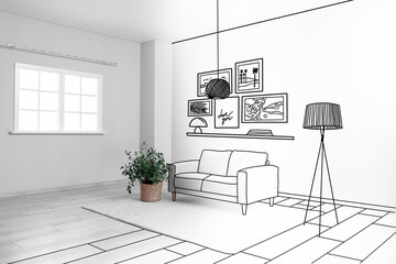 Grey sofa with houseplant, carpet and hanging lamp in big light room