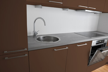 Interior of modern kitchen with brown furniture, sink and electric oven