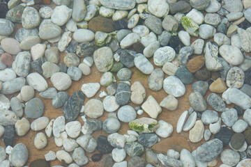Pebbles in the water for background