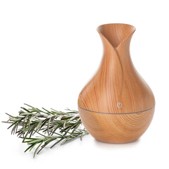 Aroma oil diffuser and rosemary on white background