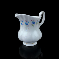 antique ceramic vase with a picturesque pattern. vintage vase with painting on black isolated background. painting.