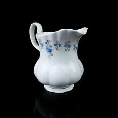 antique ceramic vase with a picturesque pattern. vintage vase with painting on black isolated background. painting.