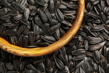 Bowl with black sunflower seeds, closeup