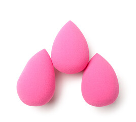 Pink makeup sponges isolated on white background