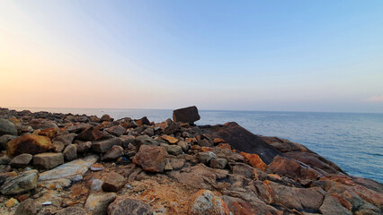 Sunrise and sunset in rocky beach of Unawatuna Sri Lanka