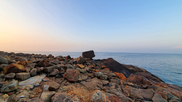 Sunrise and sunset in rocky beach of Unawatuna Sri Lanka