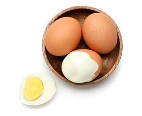 Bowl with boiled chicken eggs isolated on white background
