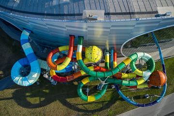 External water slides from water park building, top aerial view