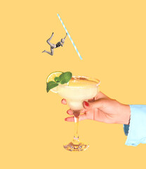 Contemporary art collage. Young girl in wimmin suit and cap jumping into delicious cocktail isolated over yellow background