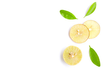 Lemon slices with green leaves on white background
